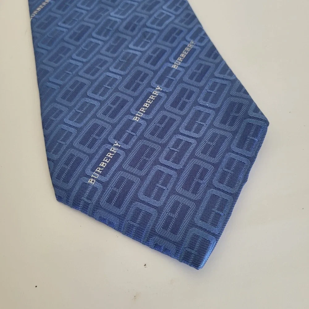 Burberry London Mens Blue Geometric Logo Silk Necktie Woven in Italy